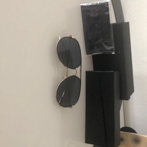 Black and gold Christian dior aviators